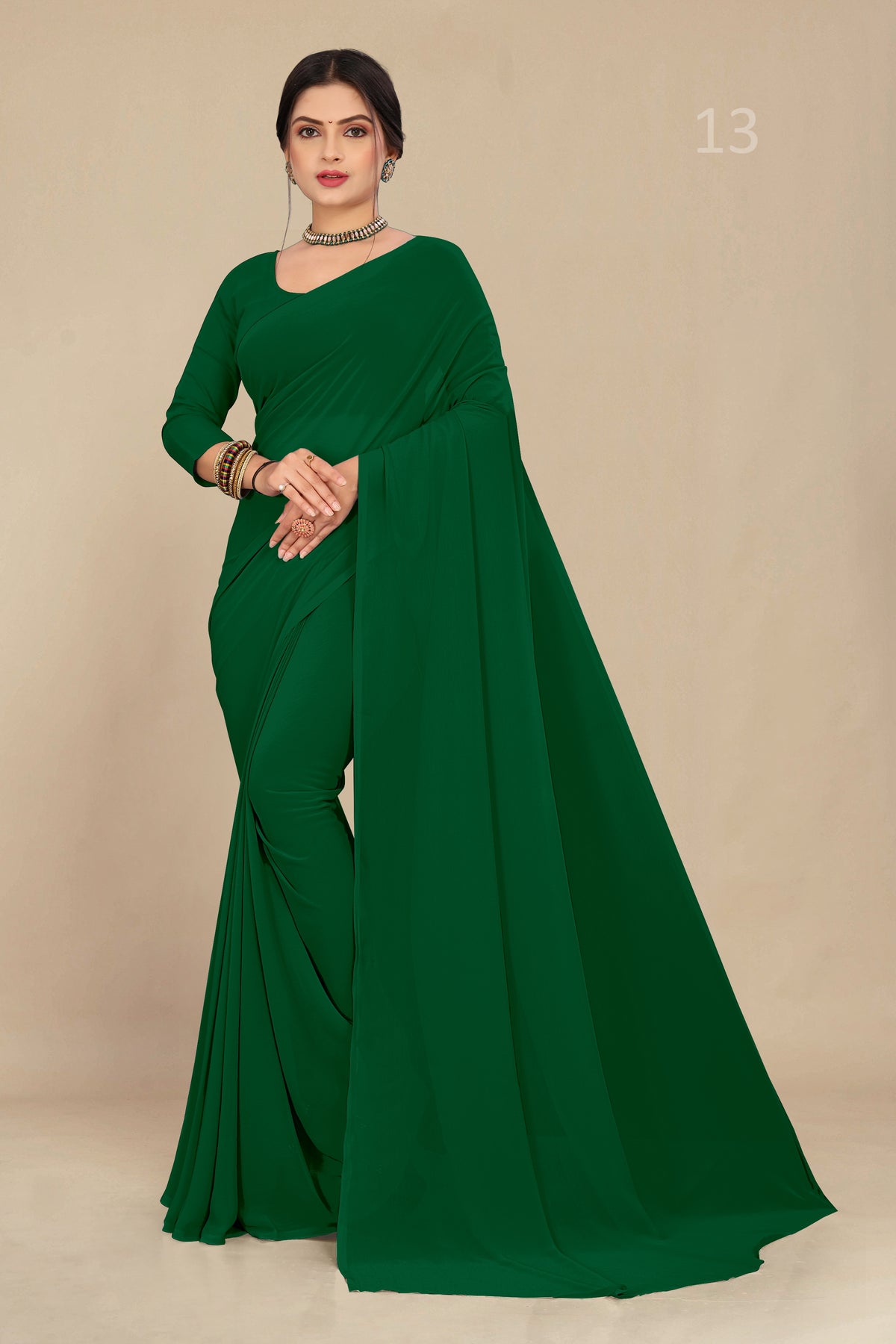 Georgette Weightless Light Bottle Green Saree With Grain Texture