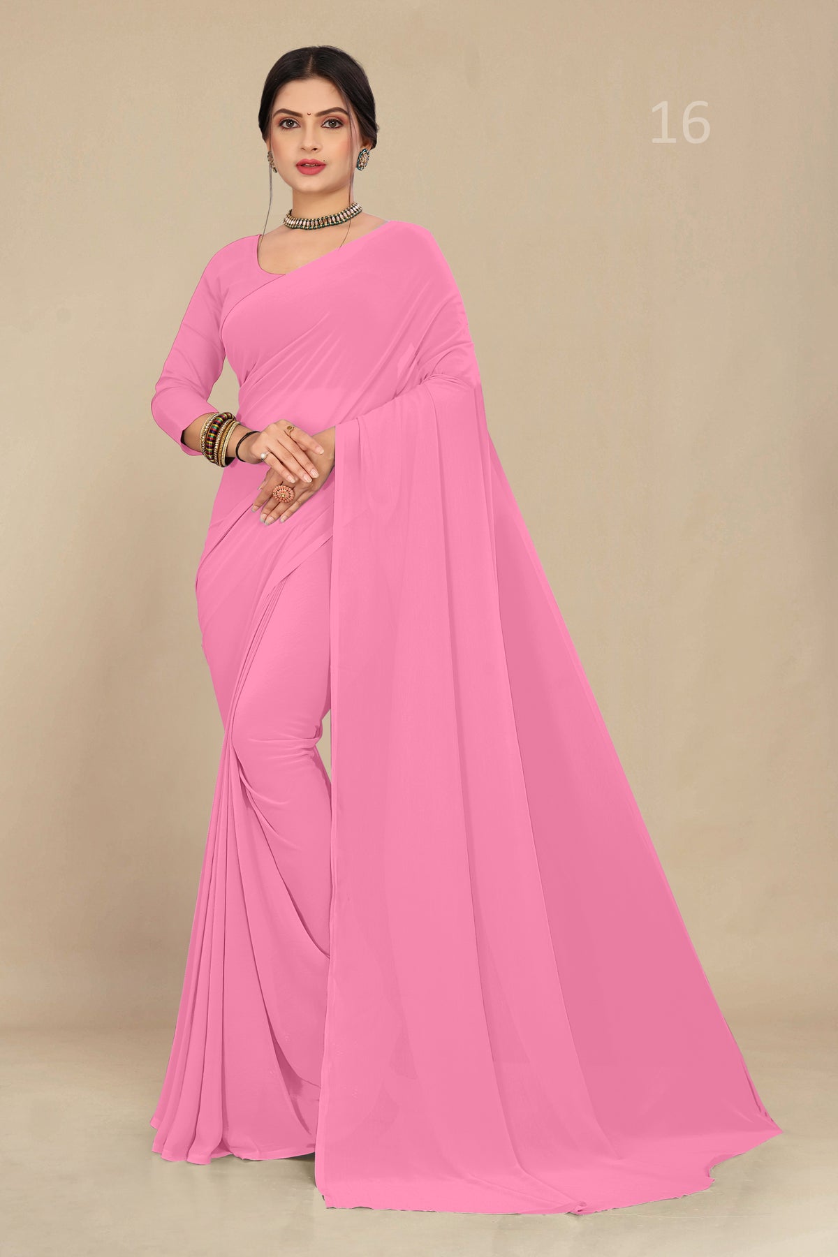 georgette weightless baby pink   saree with grain texture