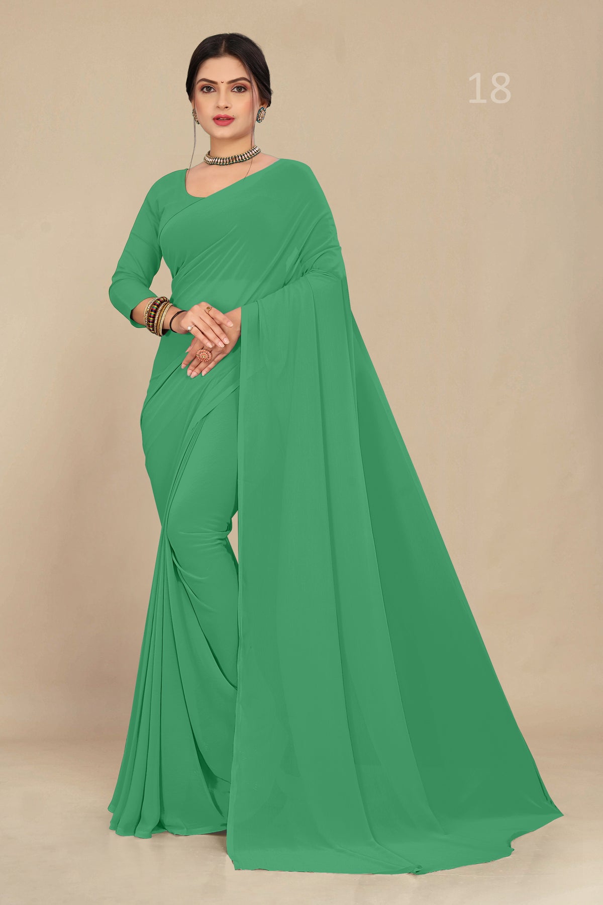 georgette weightless mint green saree with grain texture