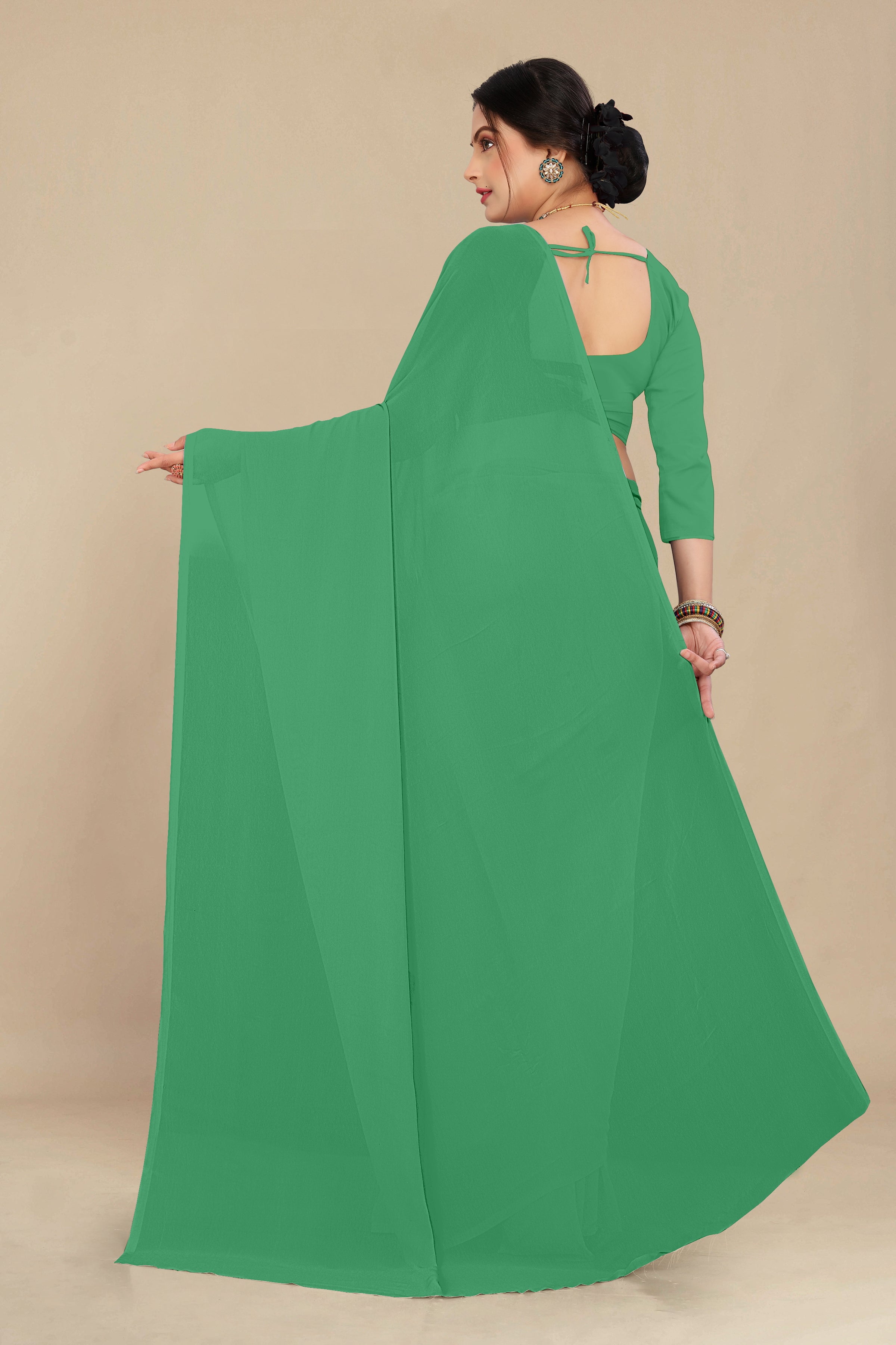 georgette weightless mint green saree with grain texture