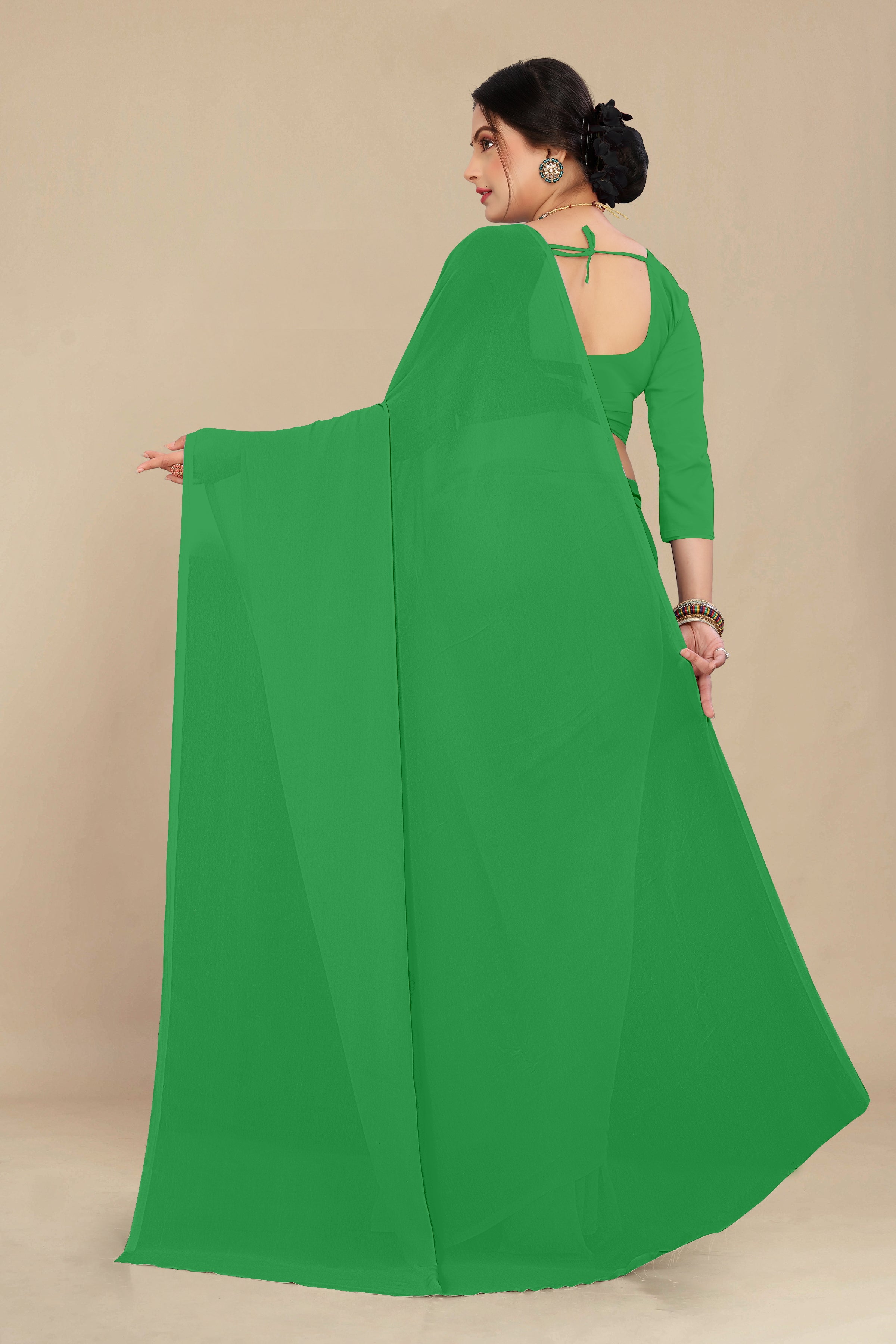 georgette weightless parrot green saree with grain texture