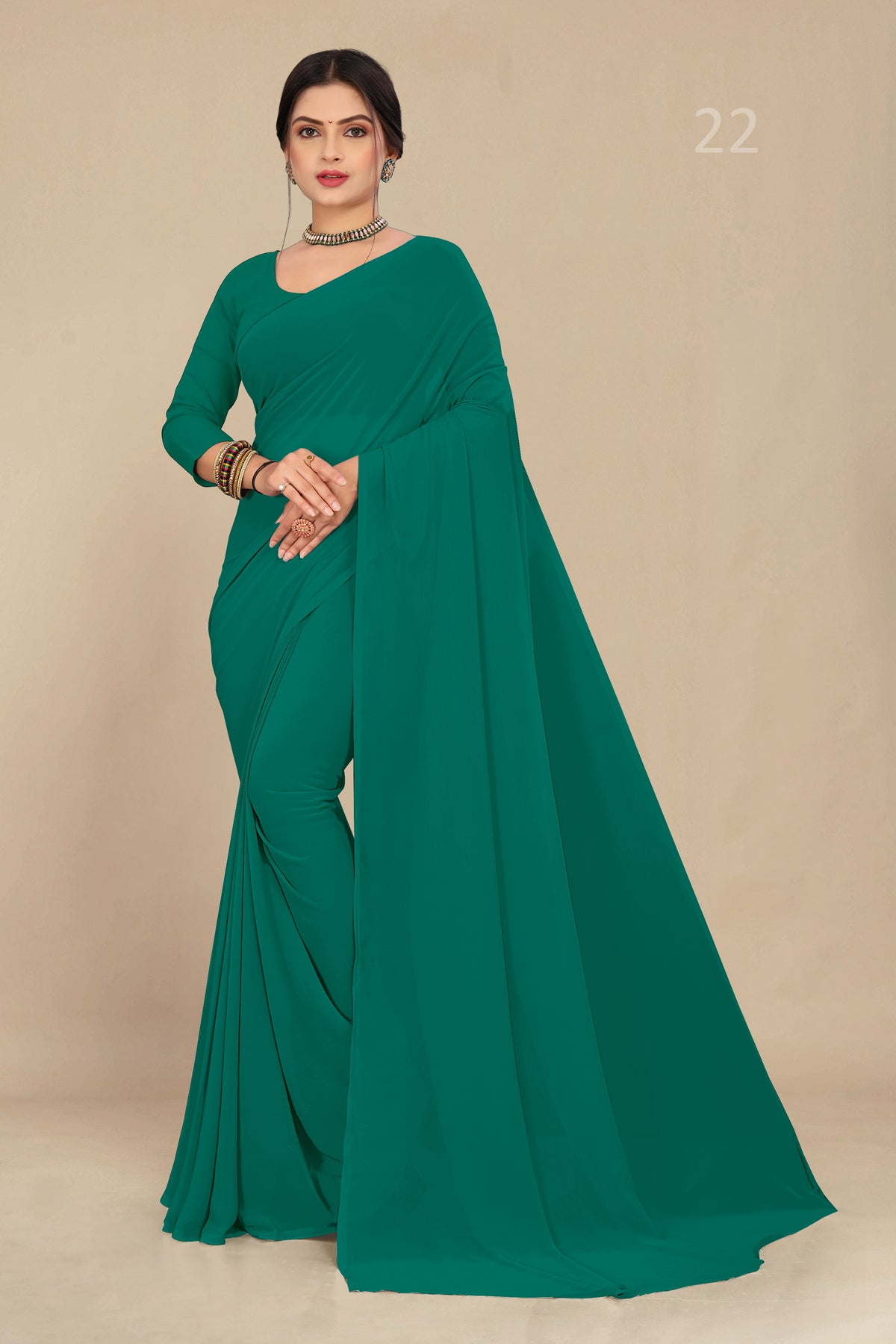 georgette weightless sea green saree with grain texture