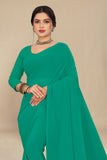 georgette weightless light green saree with grain texture