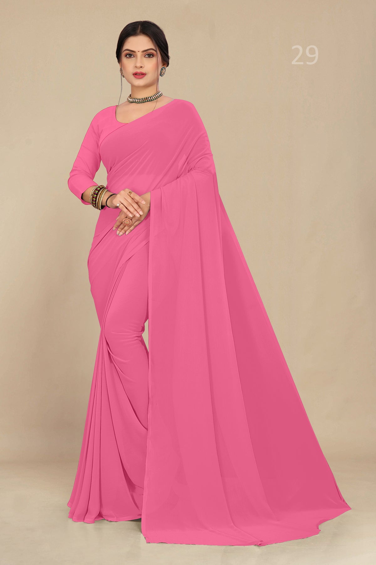 georgette weightless neon pink saree with grain texture