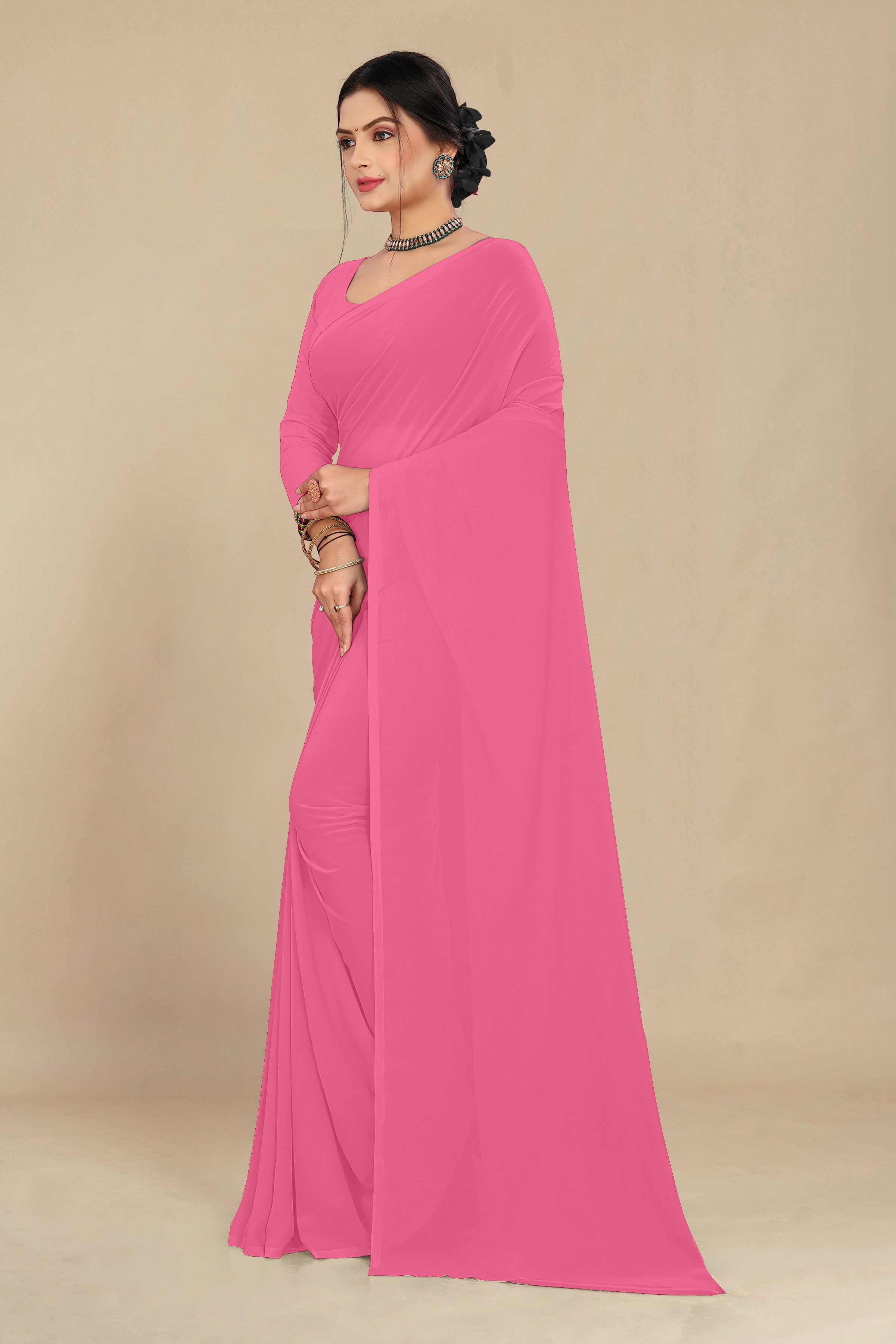 georgette weightless neon pink saree with grain texture