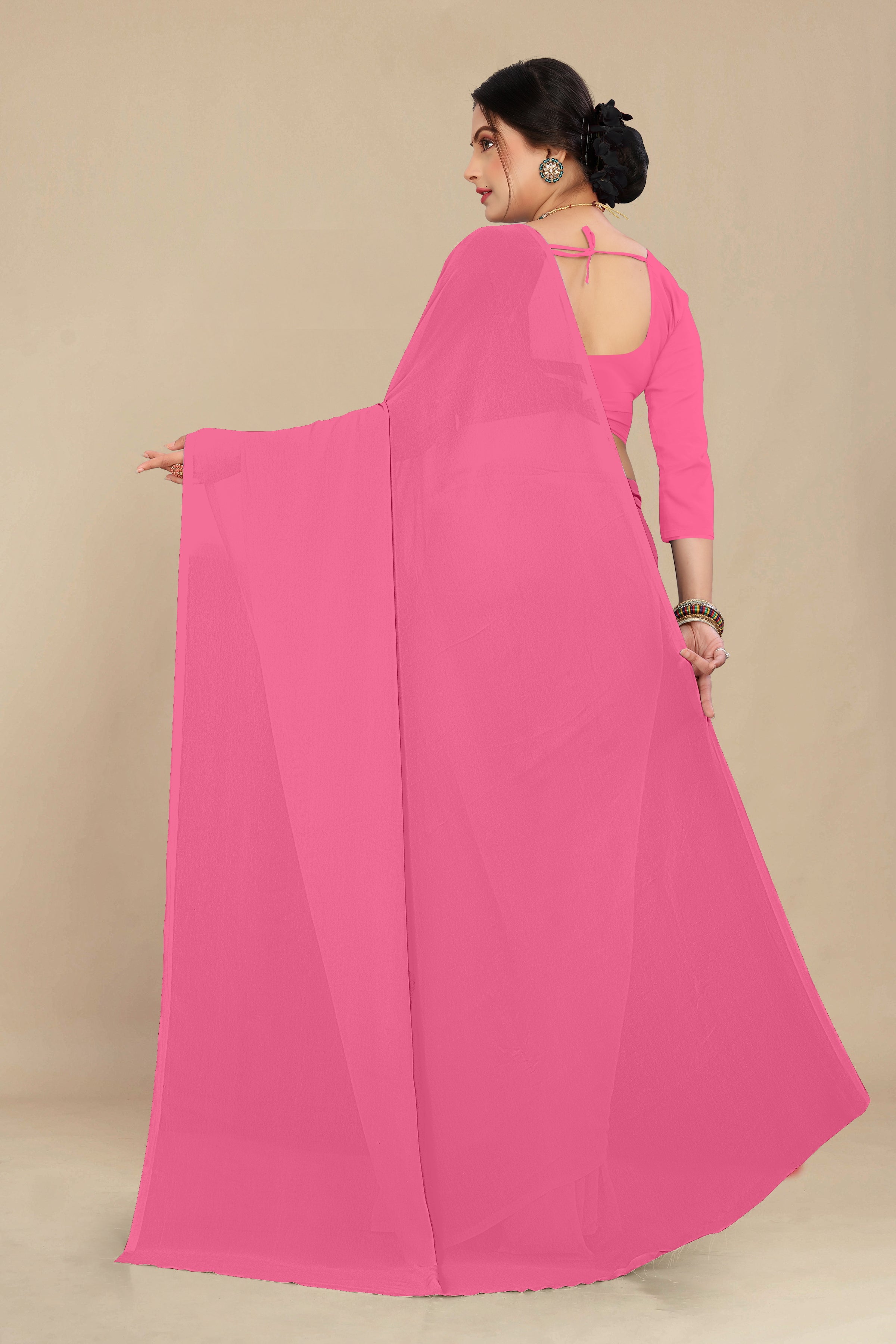 georgette weightless neon pink saree with grain texture