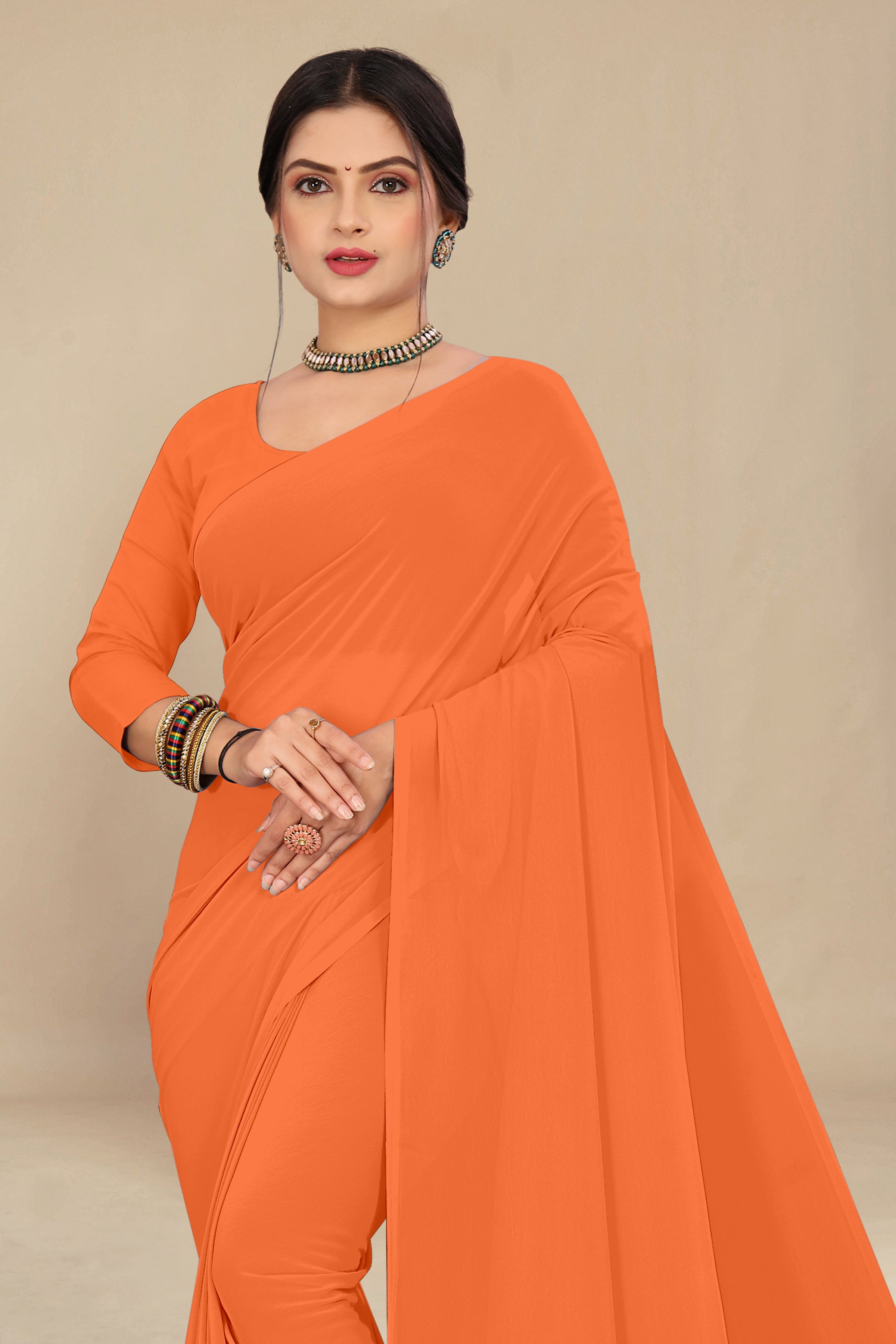 georgette weightless saffron saree with grain texture