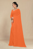 georgette weightless saffron saree with grain texture