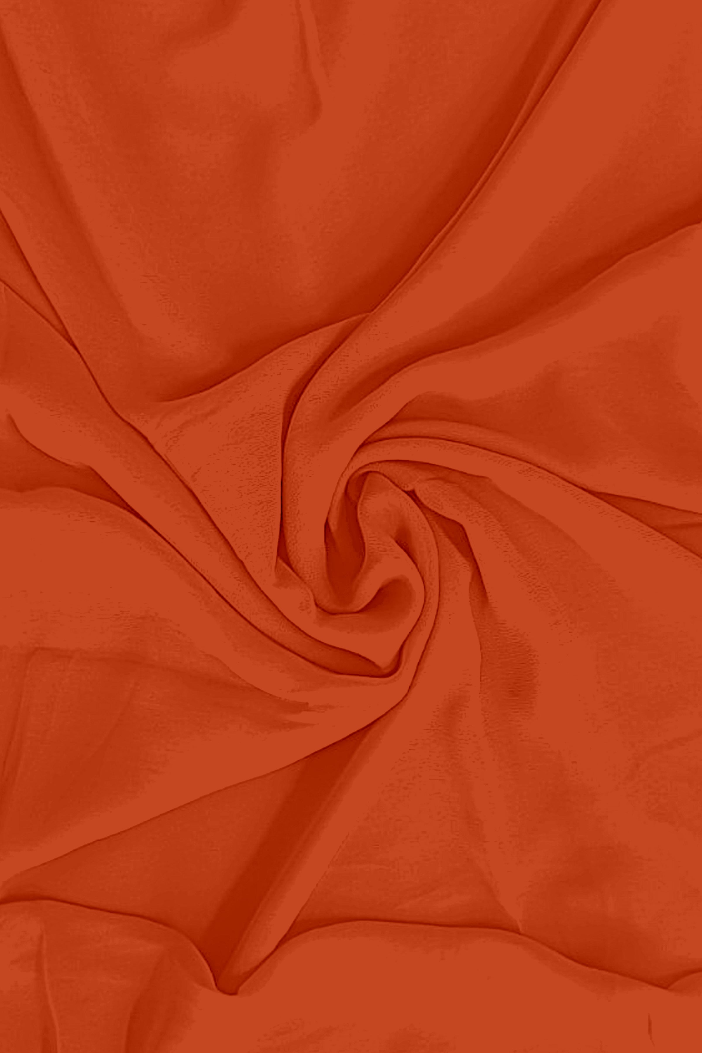 georgette weightless orange saree with grain texture