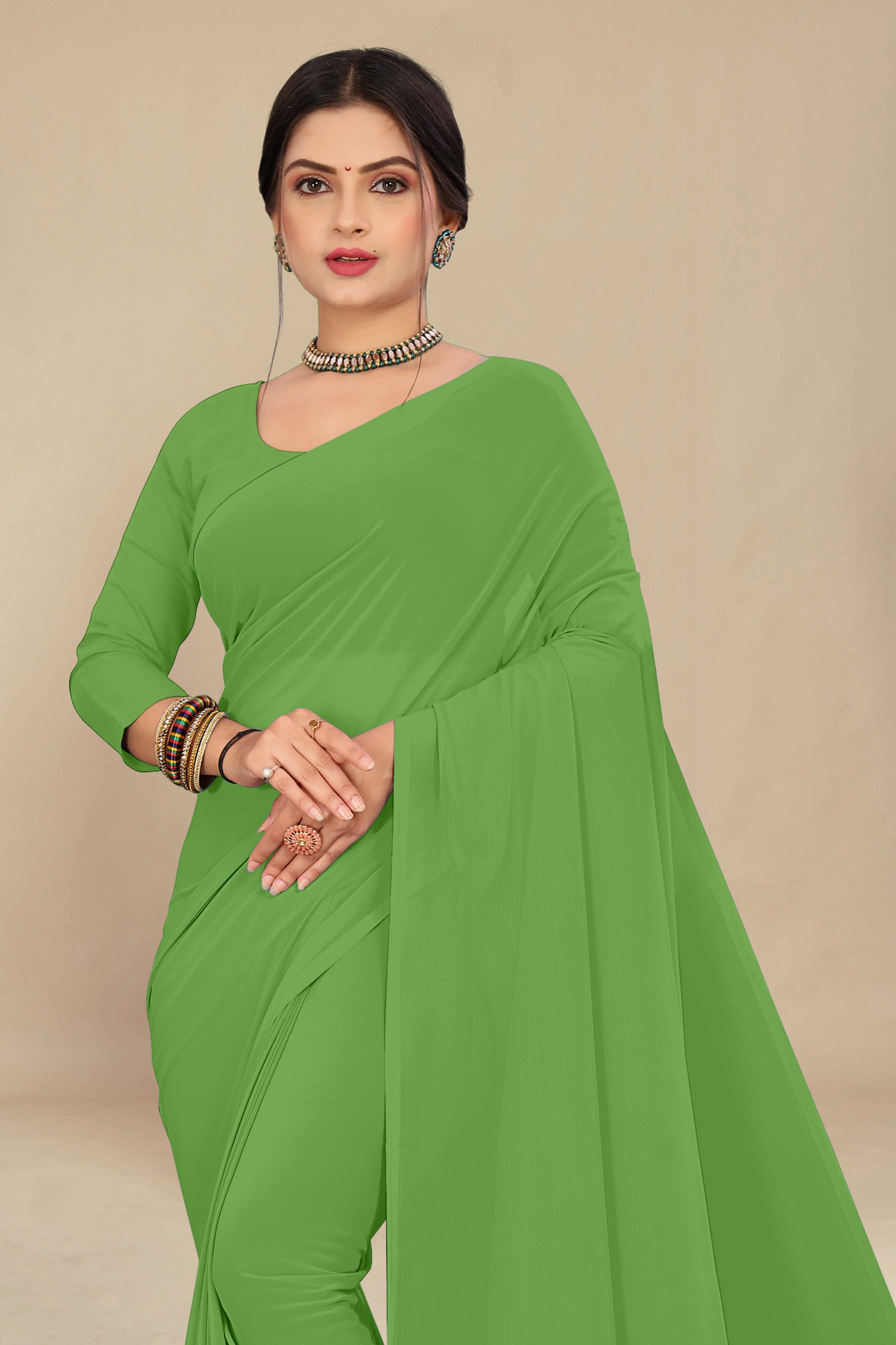 georgette weightless dull green saree with grain texture