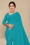 georgette weightless cyan saree with grain texture