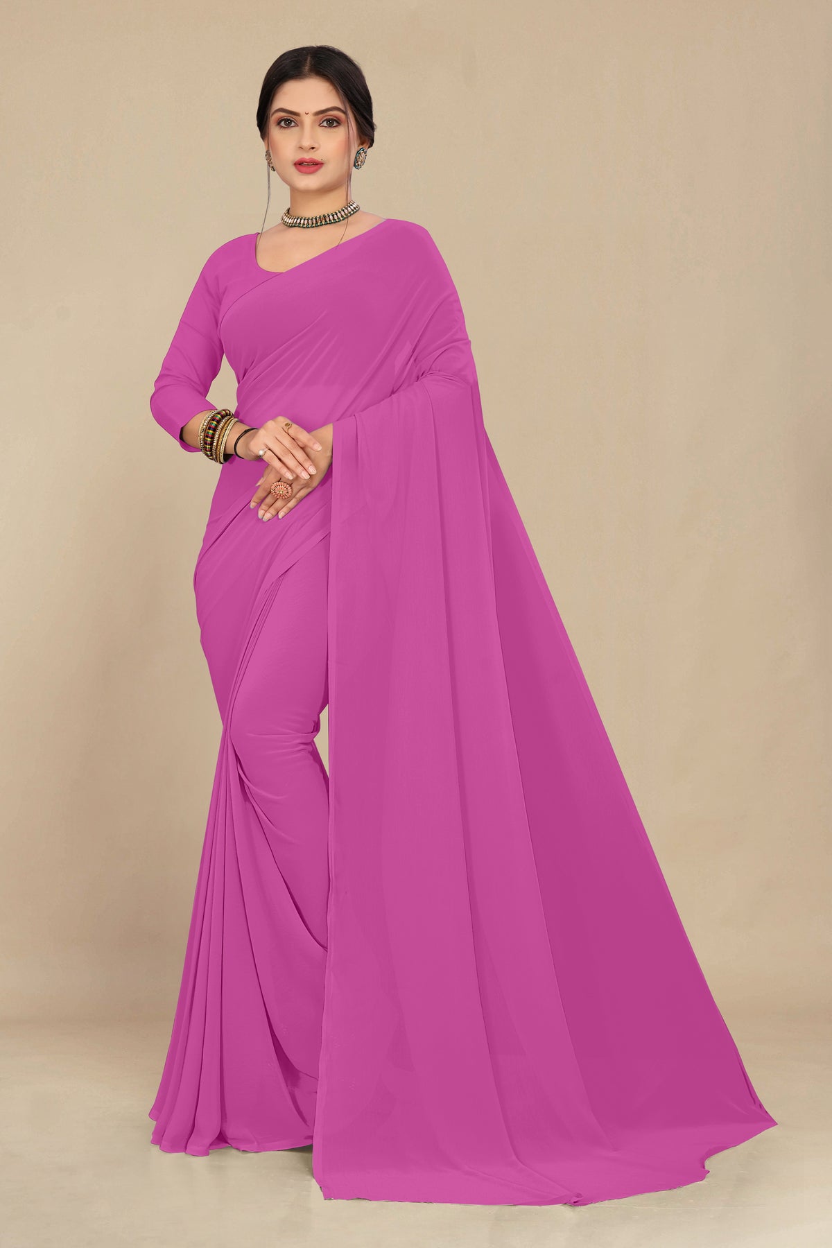 georgette weightless neon pink saree with grain texture