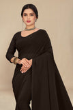 georgette weightless dark mehendi saree with grain texture