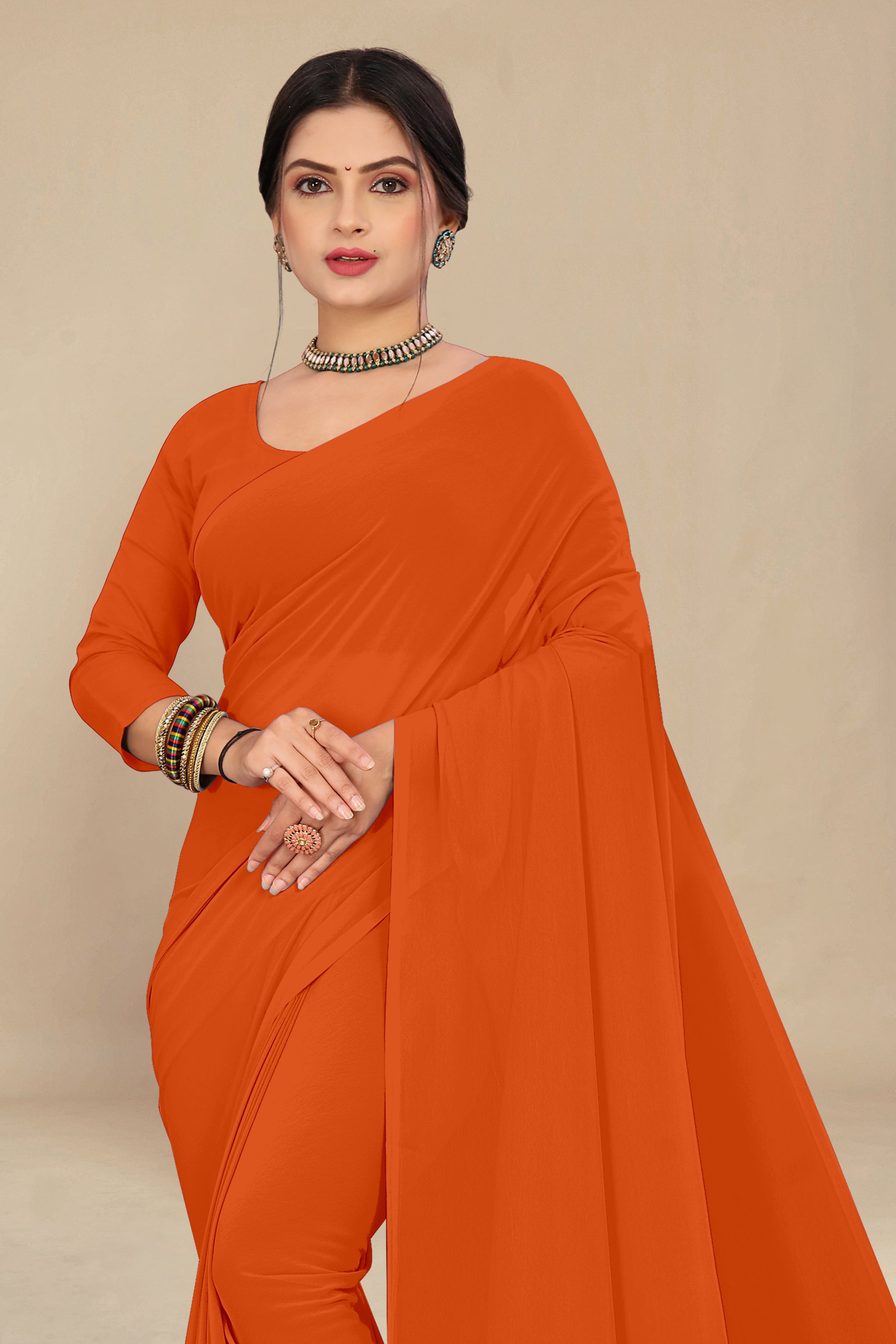 georgette weightless dark orange saree with grain texture