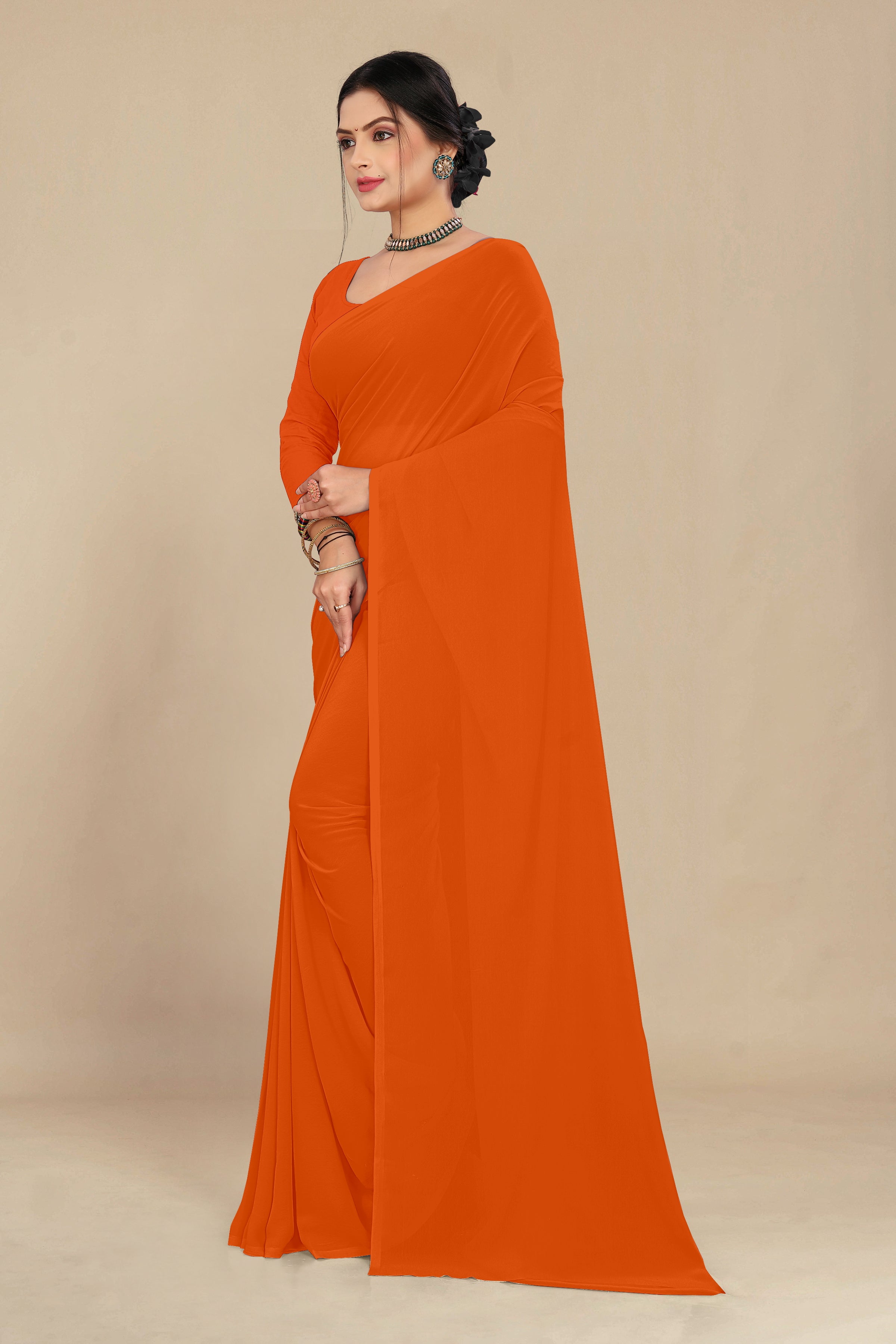 georgette weightless dark orange saree with grain texture