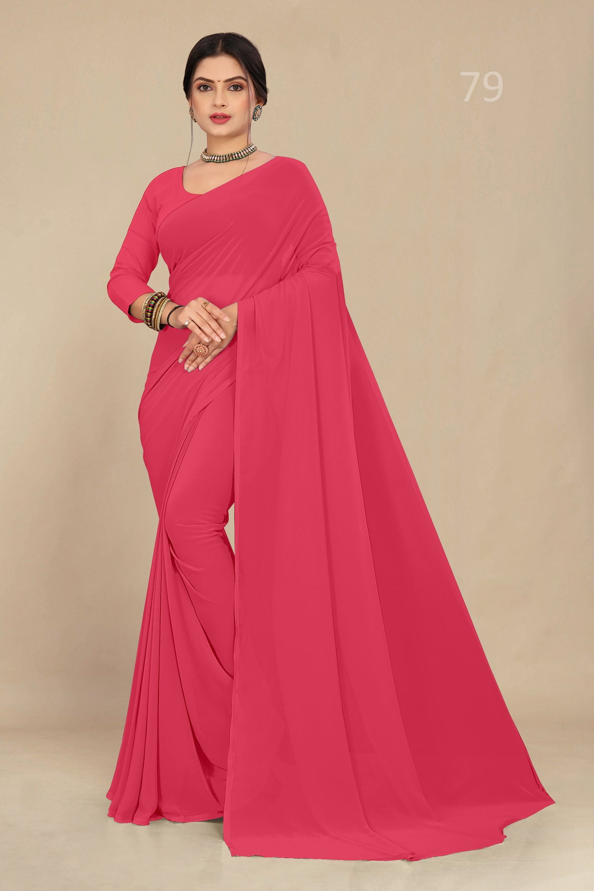 georgette weightless light carrot saree with grain texture